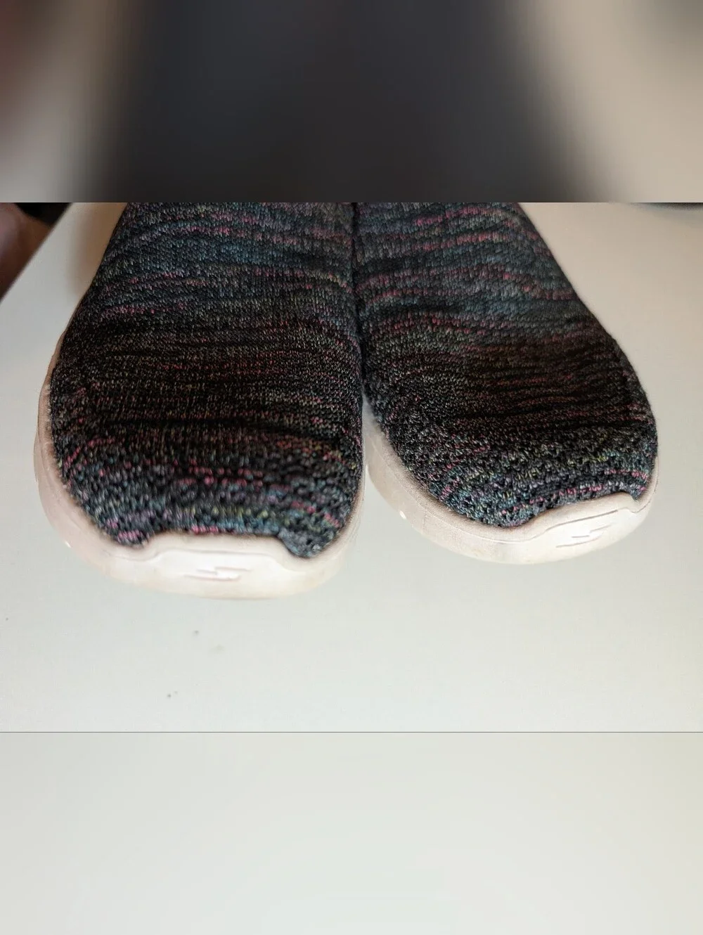 Skechers Slip-On Knit Sneakers in Black with Pink Accents